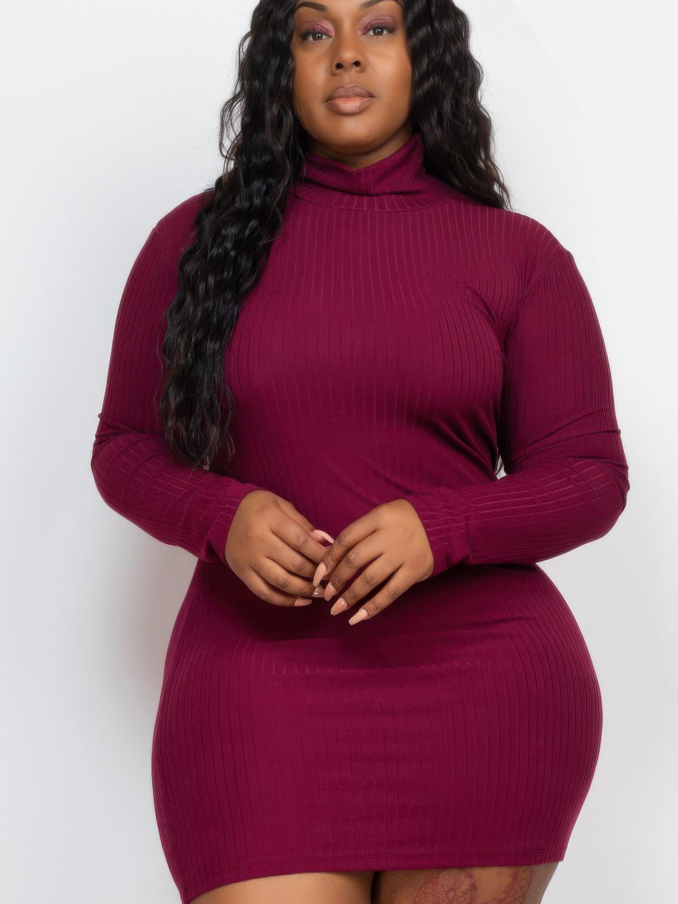 Plus size ribbed long sleeve mock neck mini bodycon dress in burgundy, showcasing a flattering fit and stylish design.