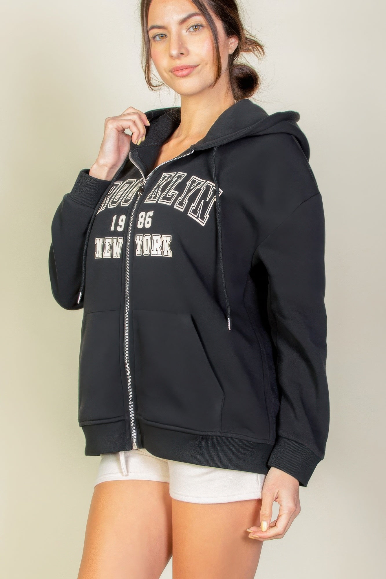 Graphic drop shoulder zipper hoodie featuring Brooklyn logo, perfect for casual style and comfort.