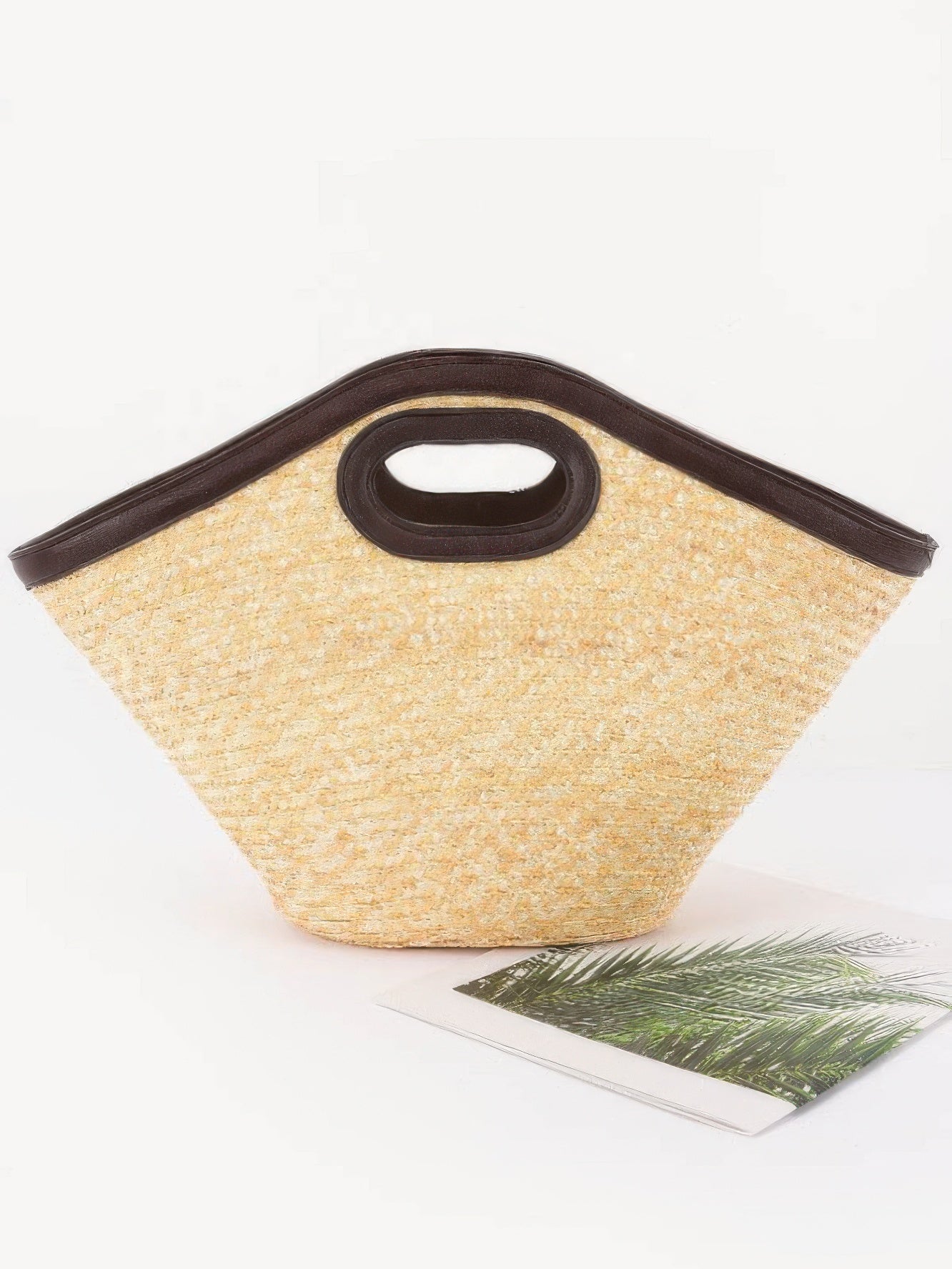 Stylish Straw Beach Bag with dark handles, perfect for summer outings and market trips.