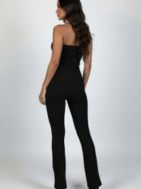 Ribbed Slit Tube Top & High-waist Flare Pants Set worn from the back, showcasing the sleek silhouette and modern design.