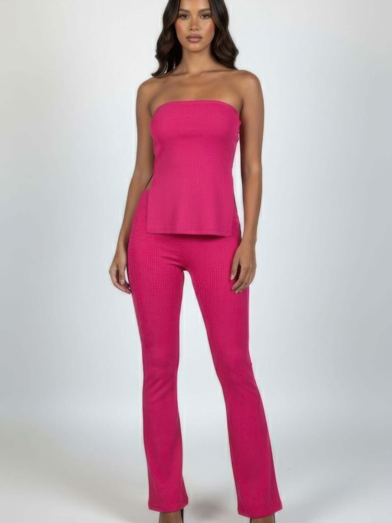 Ribbed Slit Tube Top & High-waist Flare Pants Set in bold pink, featuring a side slit and flare design for a sleek look.
