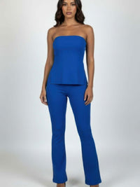 Ribbed Slit Tube Top & High-waist Flare Pants Set in bold blue color, showcasing modern style and body-hugging fit.