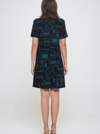 Plus size printed missy dress with short sleeves and a stylish print, viewed from the back.