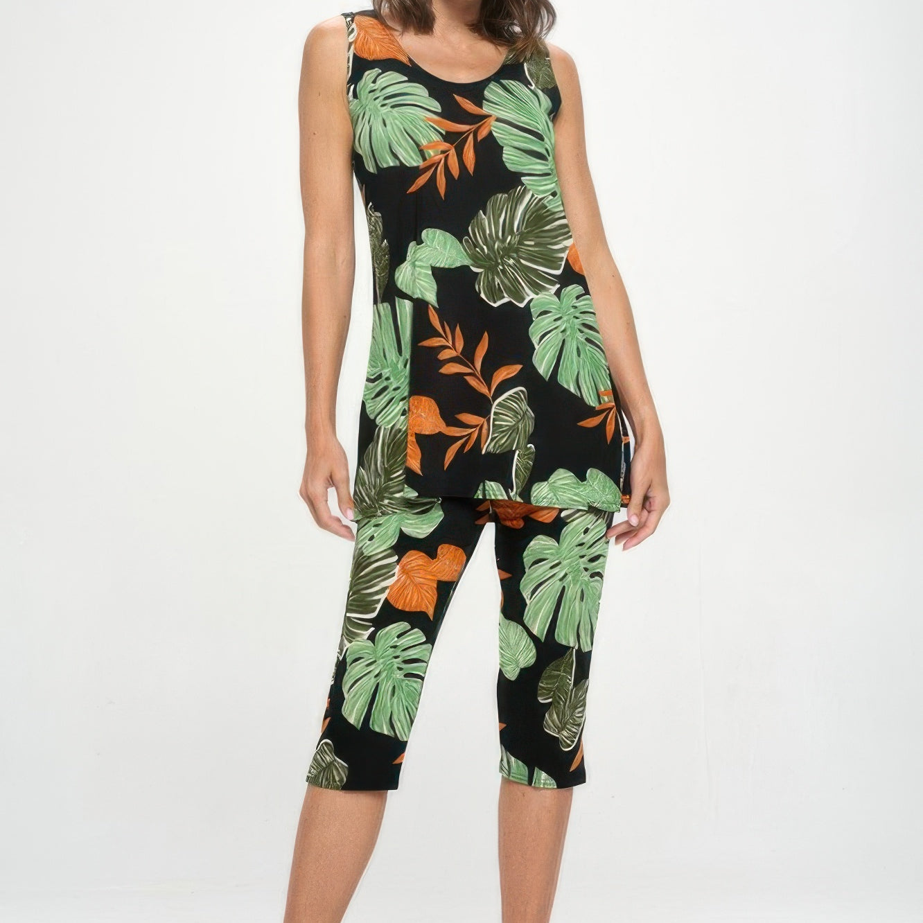 Model wearing Bns Tank Capri Pants Set featuring a sleeveless tank and Capri pants with tropical leaf patterns.