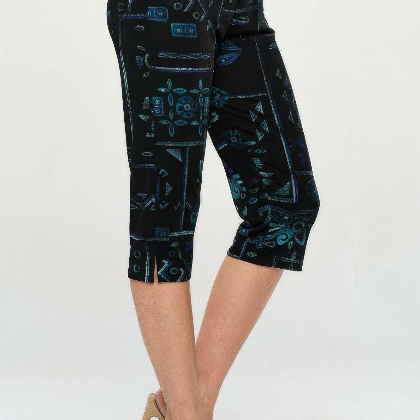 Plus size capri pants set featuring stylish printed capri pants in black and teal colors.