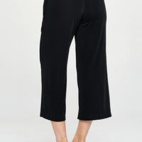 Back view of Elastic Waistband Ankle Pants with Pockets in black, featuring a comfortable fit and stylish design.