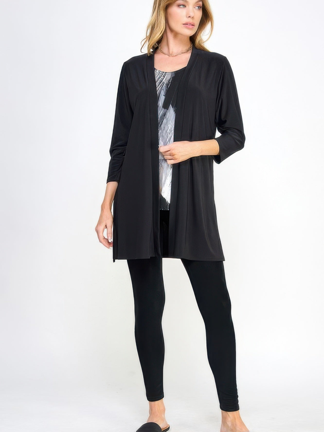 Hit Duster Jacket worn over a stylish top, paired with leggings, showcasing a relaxed and polished look.