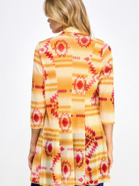 Back view of the Mr Princess Jacket showcasing a colorful geometric pattern in vibrant hues.