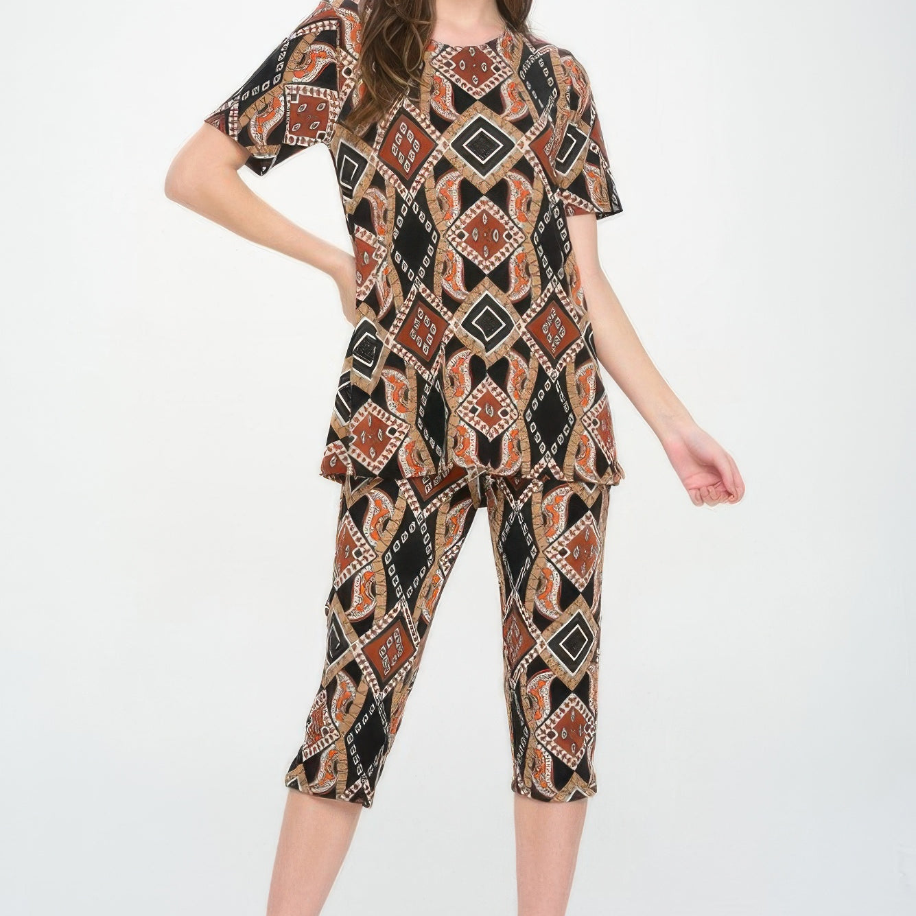 Short Sleeve Top Capri Pants Set in bold prints, featuring a round neckline and relaxed cropped silhouette.