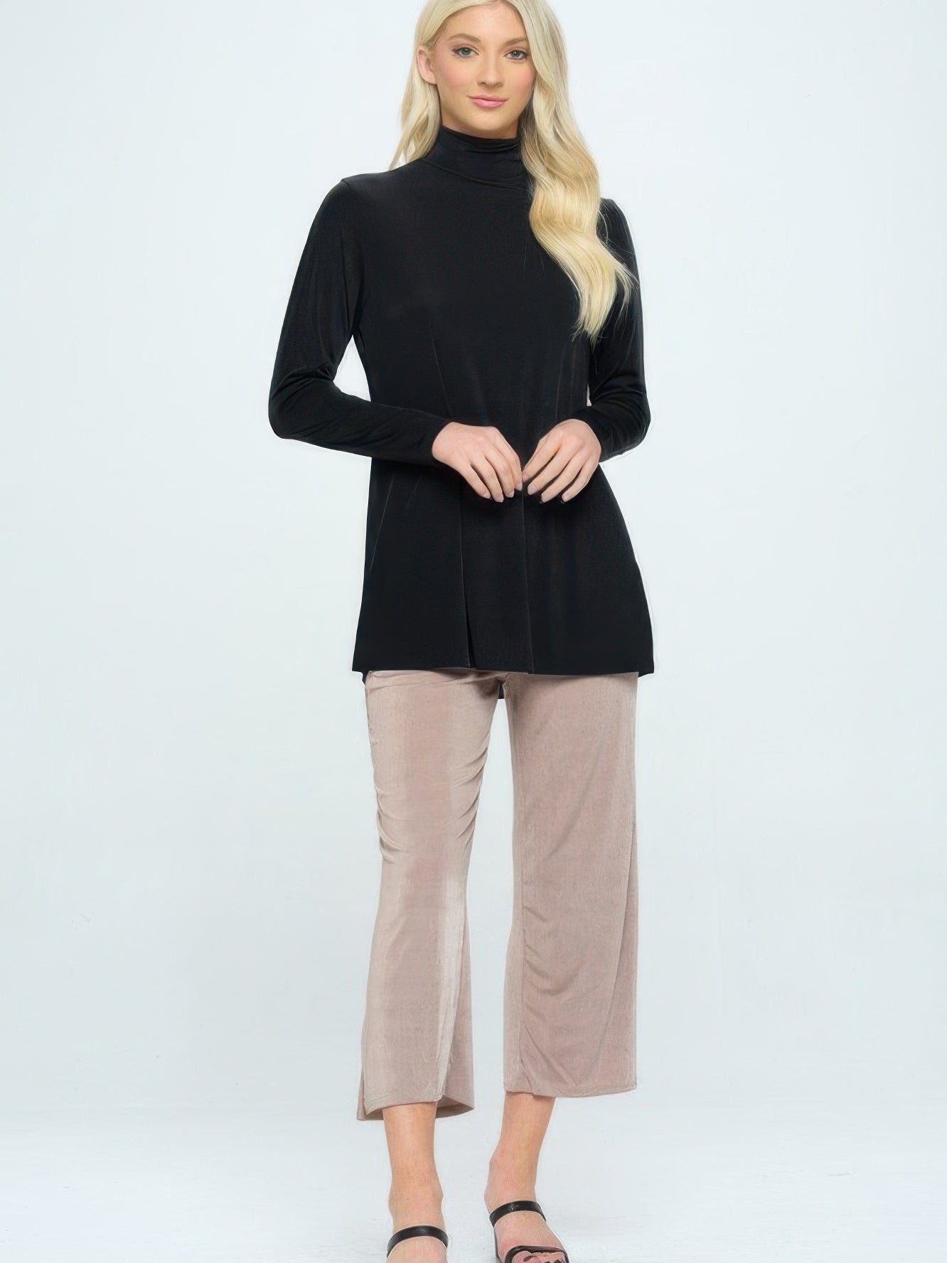 BNS Mock Turtle Neck Top worn with stylish cropped pants, showcasing a sleek silhouette and comfortable fit.