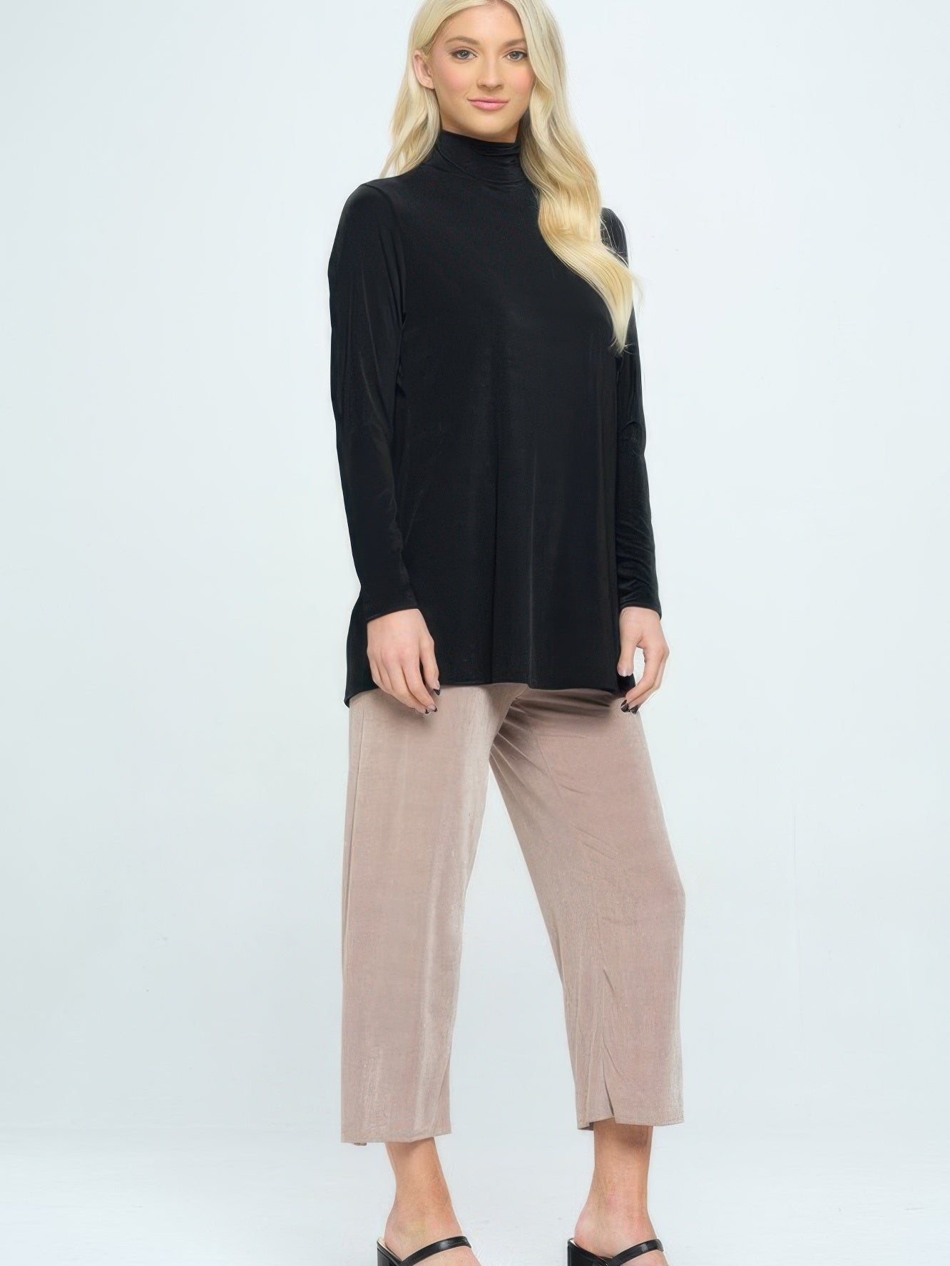 BNS Mock Turtle Neck Top worn with light-colored pants, showcasing its comfortable stretch fit and mock neckline.