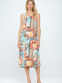 Short Sleeve And Soft Round-Neckline Long Dress featuring a colorful geometric print, perfect for warm weather styling.