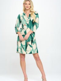 Hit Notch Neck Quarter Sleeve Dress in a green and cream leaf print, featuring a flattering notch neckline and quarter-length sleeves.