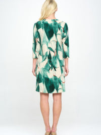 Hit Notch Neck Quarter Sleeve Dress featuring a green leaf print and quarter-length sleeves from the back view.