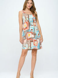 BNS Print Missy Tank Dress displayed on a model, featuring a colorful geometric print and sleeveless design.