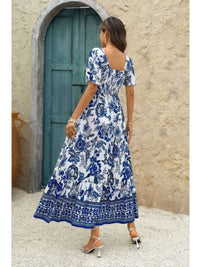 Square Neck Floral Printed Ankle Length A Line Dress showcased against a rustic background with blue floral details.