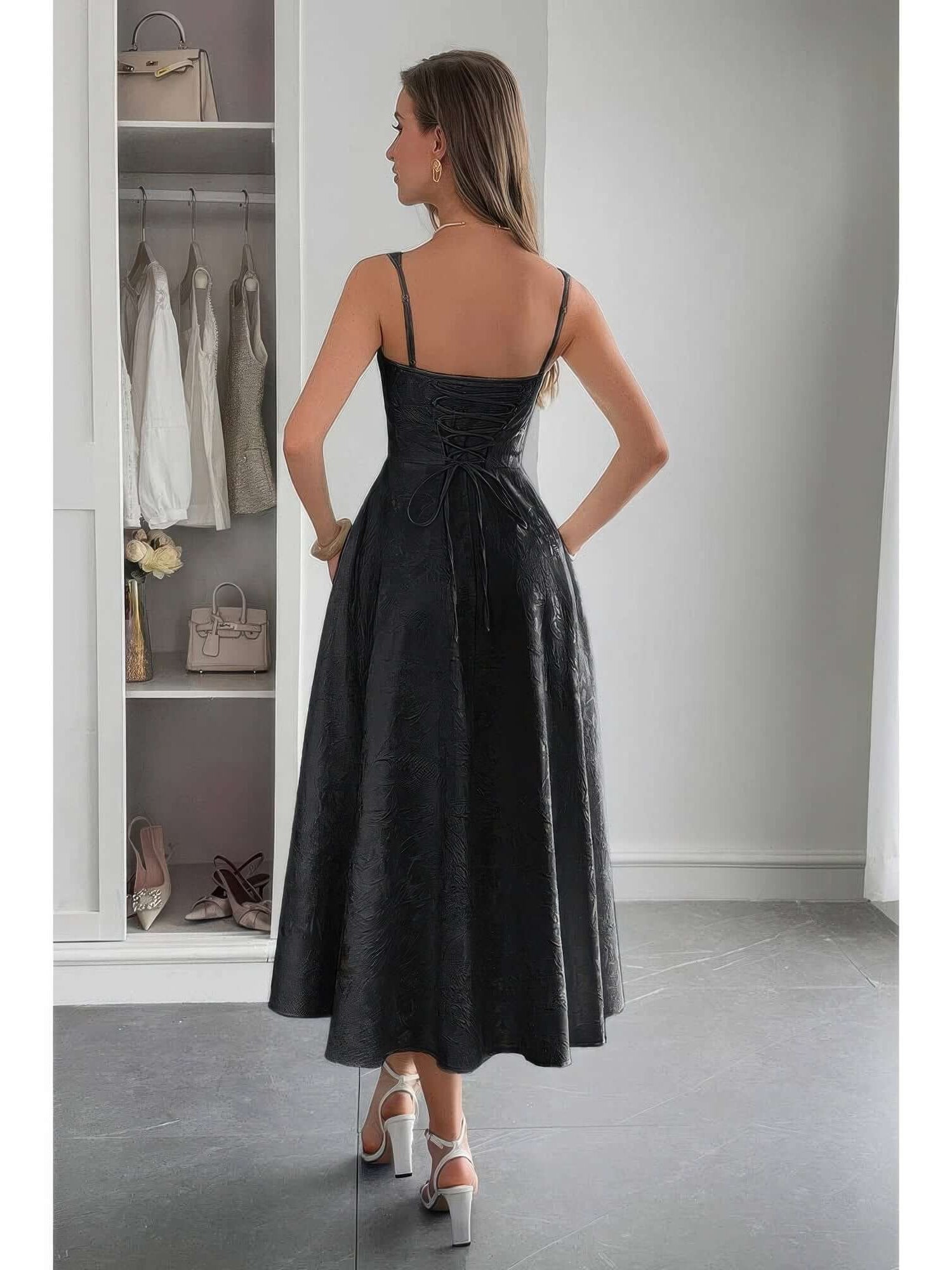 Back view of a model wearing a Solid Floral Jacquard Lace High Waist Dress in a stylish setting.