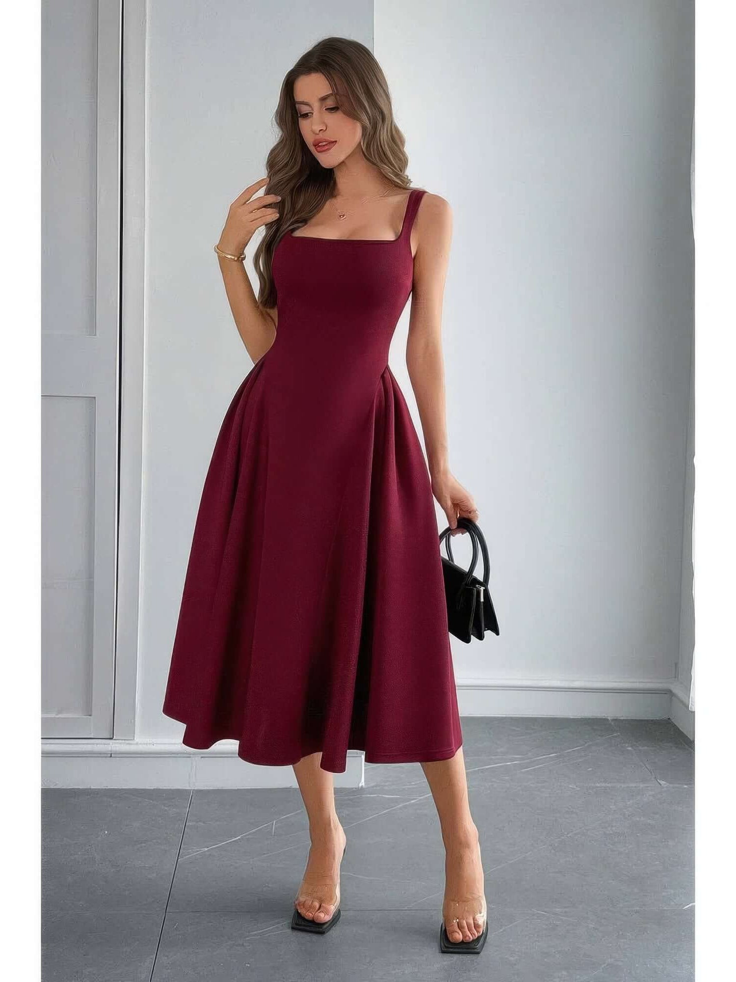 Square Neck A Line Pleated Sleeveless Long Dress in burgundy worn by a model with black accessories.