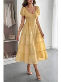 Solid Backless Tiered Puff Sleeve Fit Midi Dress in yellow with puff sleeves and tiered skirt, perfect for special occasions.