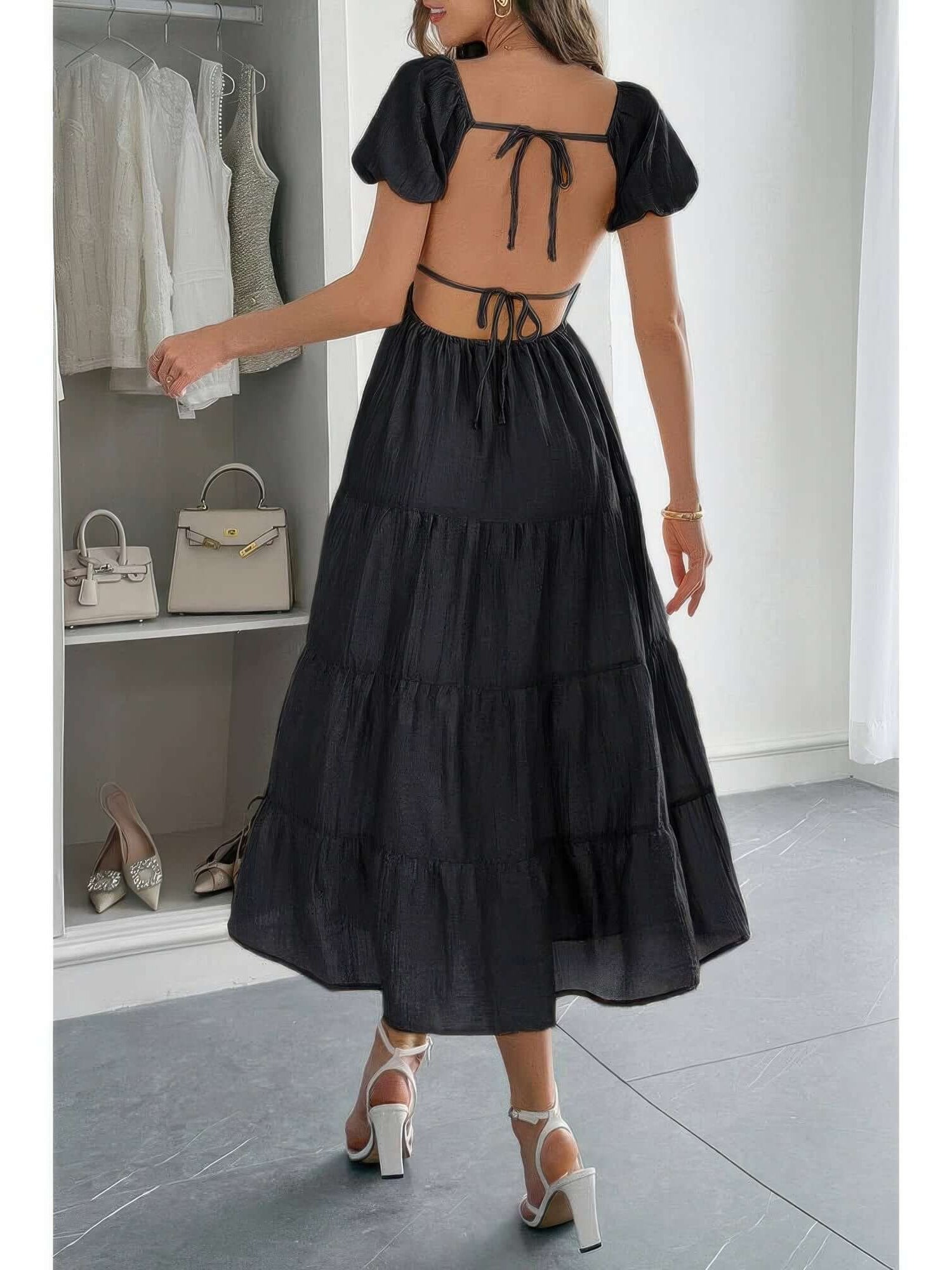Solid Backless Tiered Puff Sleeve Fit Midi Dress showcasing a back view, featuring puff sleeves and a tiered skirt.