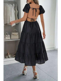 Solid Backless Tiered Puff Sleeve Fit Midi Dress showcasing a back view, featuring puff sleeves and a tiered skirt.