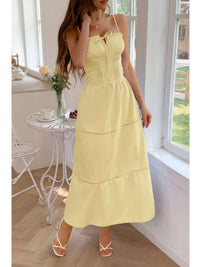 Solid Button Decor Pintuck Eyelet Shirred Dress in yellow with delicate button detail and a flattering shirred waistline.