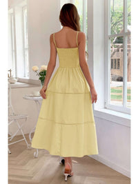 Solid Button Decor Pintuck Eyelet Shirred Dress back view, in light yellow with a tiered skirt and adjustable straps.