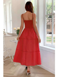 Solid Button Decor Pintuck Eyelet Shirred Dress worn by a model from the back in a bright setting.