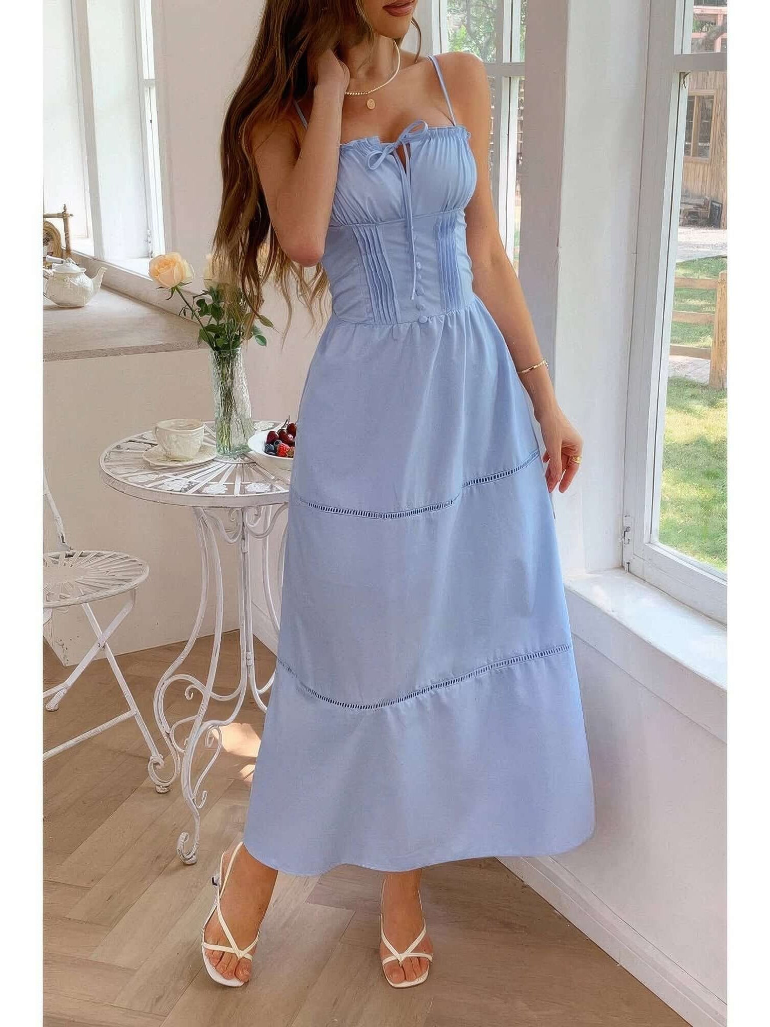 Solid Button Decor Pintuck Eyelet Shirred Dress showcased in light blue, featuring strap design and flattering shirred waistline.