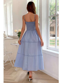 Solid Button Decor Pintuck Eyelet Shirred Dress showing back view in soft blue, perfect for casual outings.