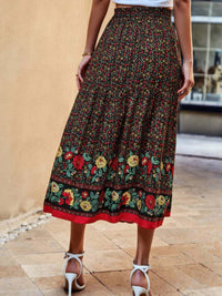 Drawstring Floral Ruffled Maxi Skirt featuring a colorful floral print and ruffled hem, perfect for warm weather.
