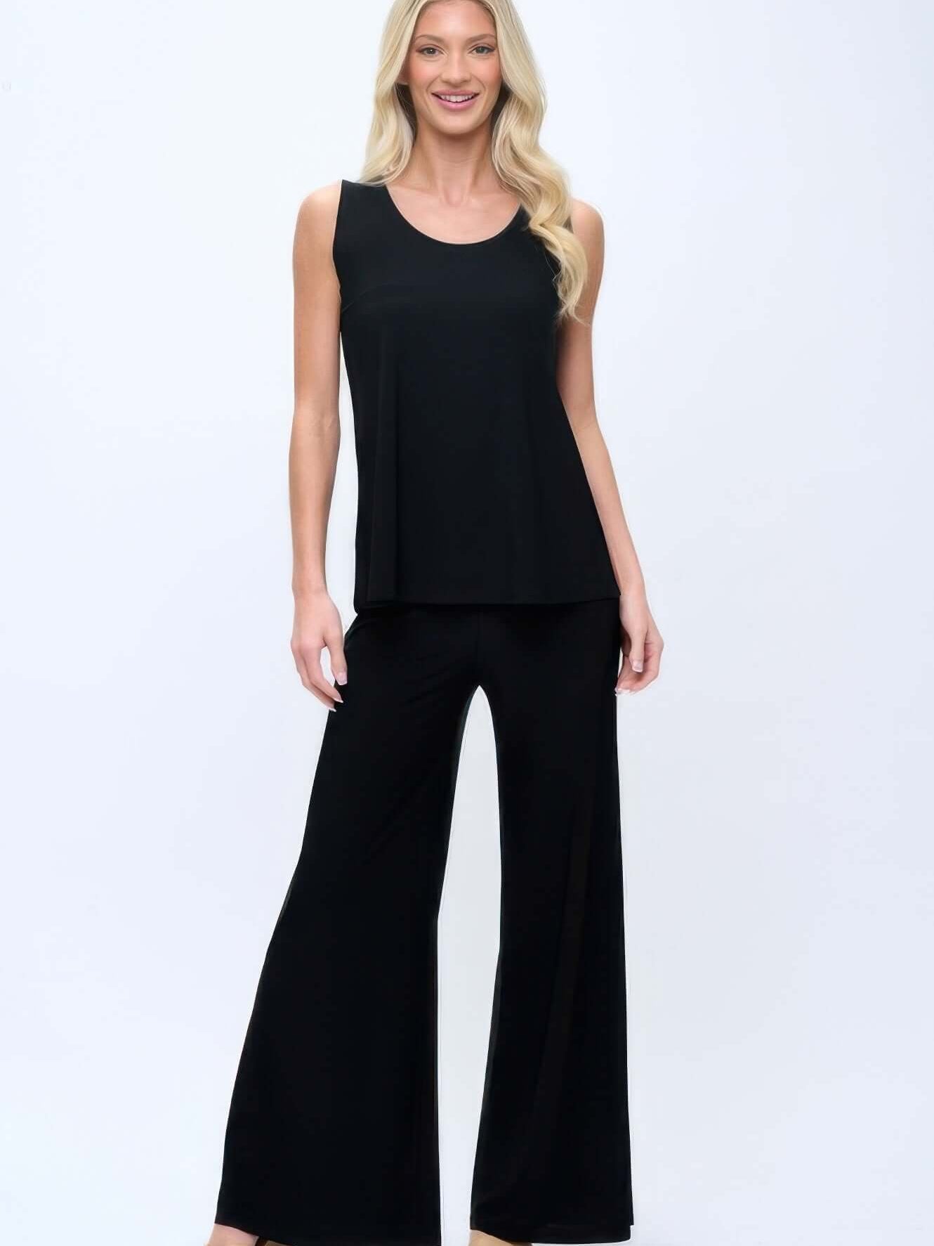 Woman wearing Hit Palazzo Pants with a sleeveless top, showcasing comfort and stylish wide-leg design.