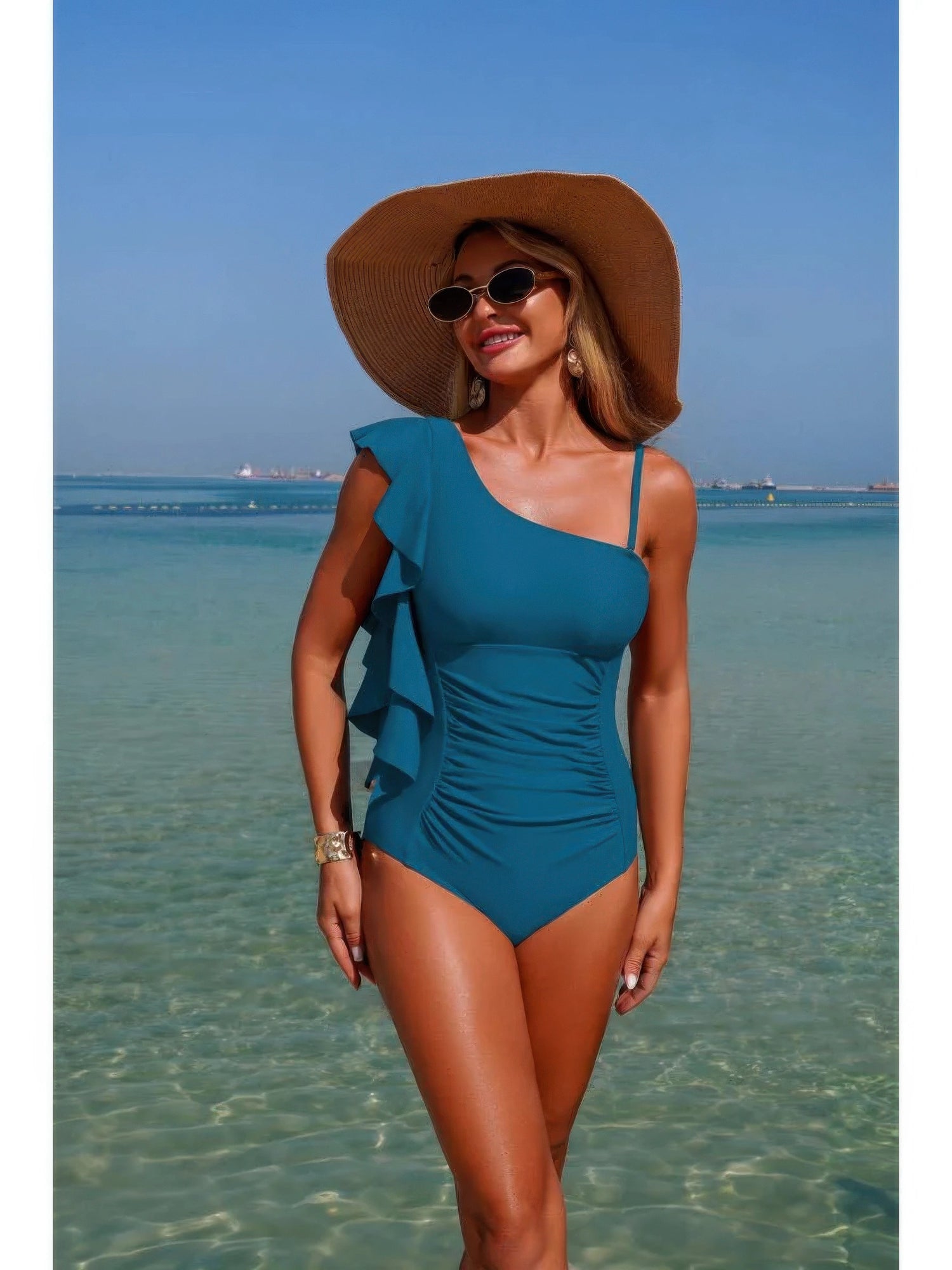 The Cannes Ruffle One-Piece – asymmetric one-shoulder one-piece swimsuit with cascading ruffle