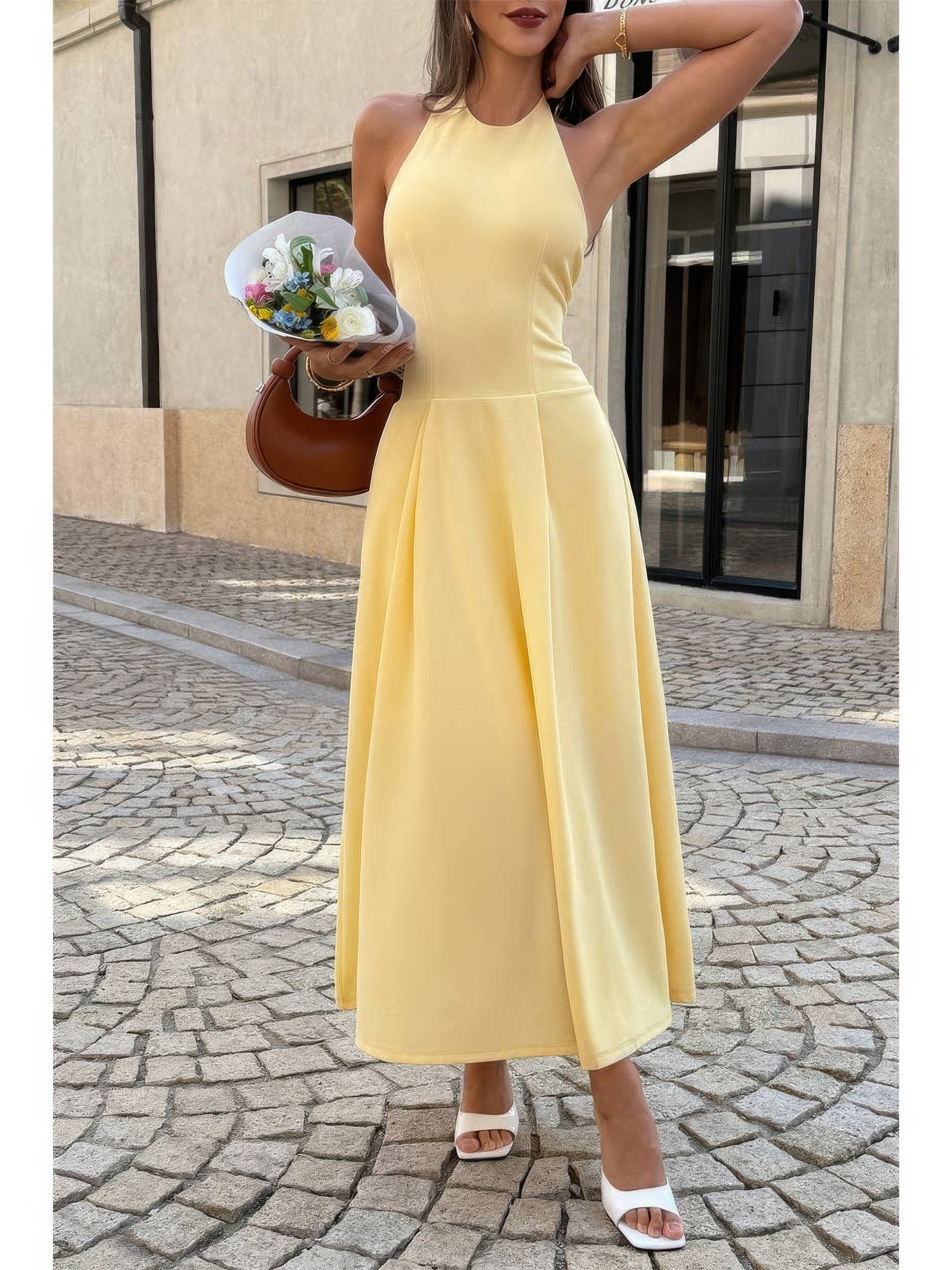 The Daphne Halter Midi – yellow halter dropped hem midi dress, view 2