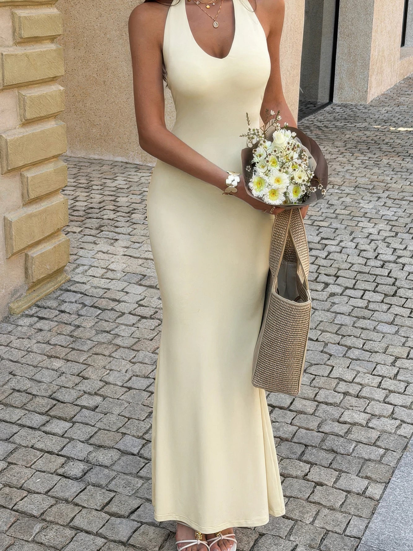 The Saffron Halter Maxi – yellow V-neck halter maxi dress with back split