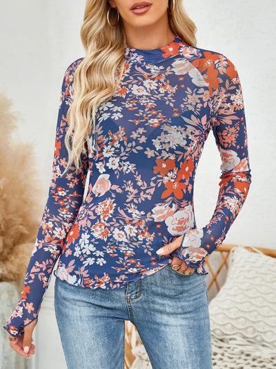 Floral Mock Neck Long Sleeve Top worn by a model, featuring a colorful floral print and long sleeves.