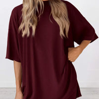 Full Size Oversized Slit Round Neck Top and Shorts Lounge Set Plus Size in burgundy worn by model.