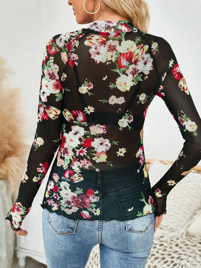 Floral Mock Neck Long Sleeve Top featuring a vibrant floral design and slightly stretchy material, perfect for any casual outing.