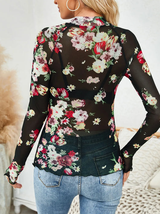 Floral Mock Neck Long Sleeve Top featuring a vibrant floral design and slightly stretchy material, perfect for any casual outing.