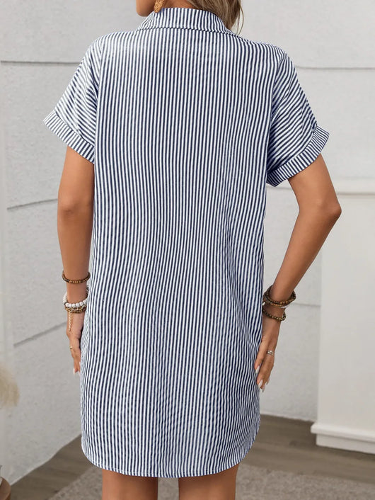 Back view of a Striped Button Down Short Sleeve Mini Dress showcasing its vertical stripes and relaxed fit.