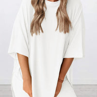 Full Size Oversized Slit Round Neck Top and Shorts Lounge Set Plus Size in white color on a model.