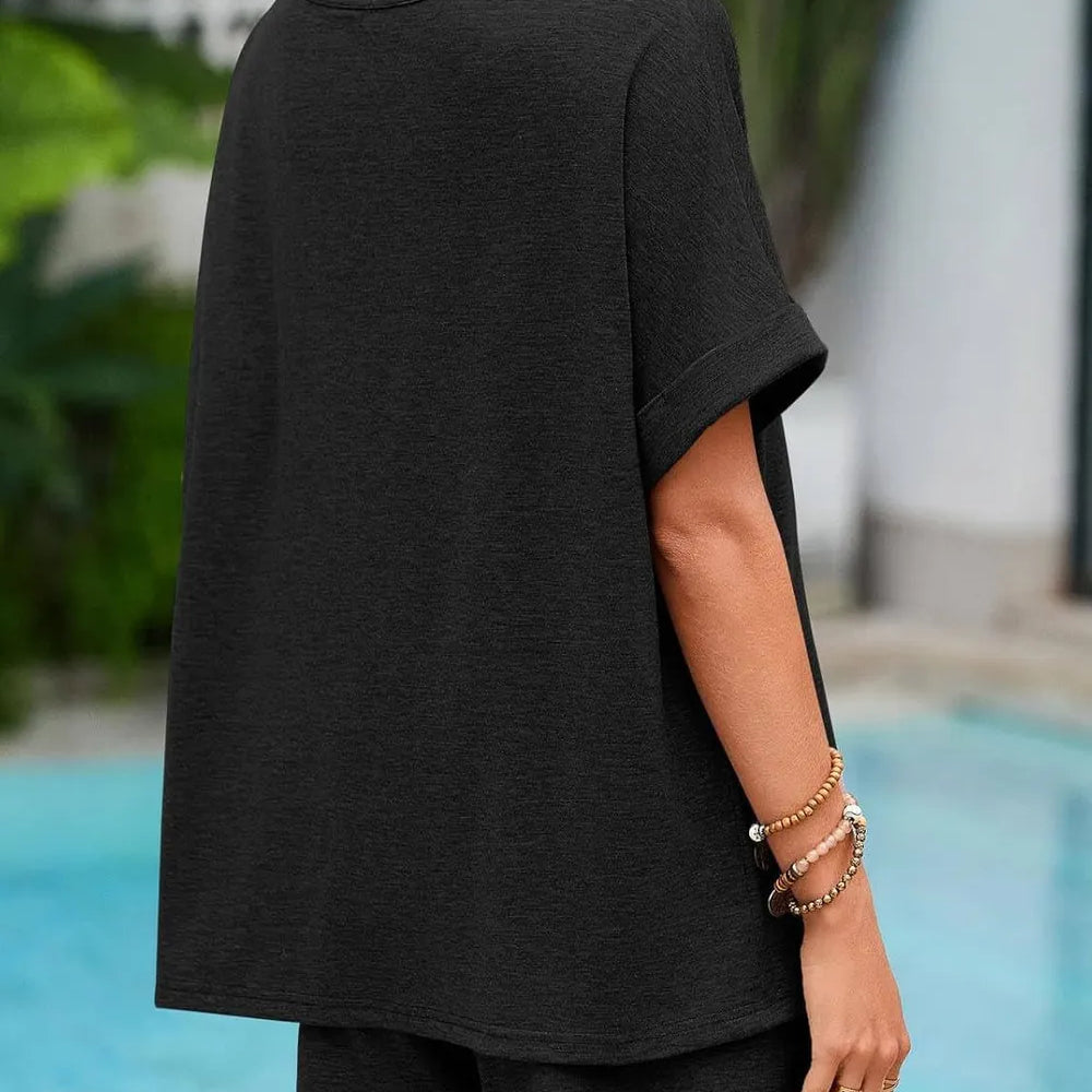 Back view of a woman wearing a Round Neck T-Shirt and Drawstring Shorts Set by the pool.