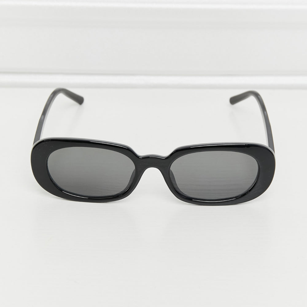 Oval Full Rim Sunglasses with black lenses in a sleek design on a white background.