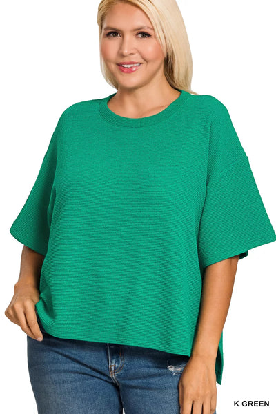 Zenana Full Size Double Knit Side Slits Hi Low Short Sleeve Top Plus Size in vibrant green worn by a model.