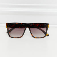 Tortoise Shell Square Full Rim Sunglasses displaying their stylish design and gradient lenses.