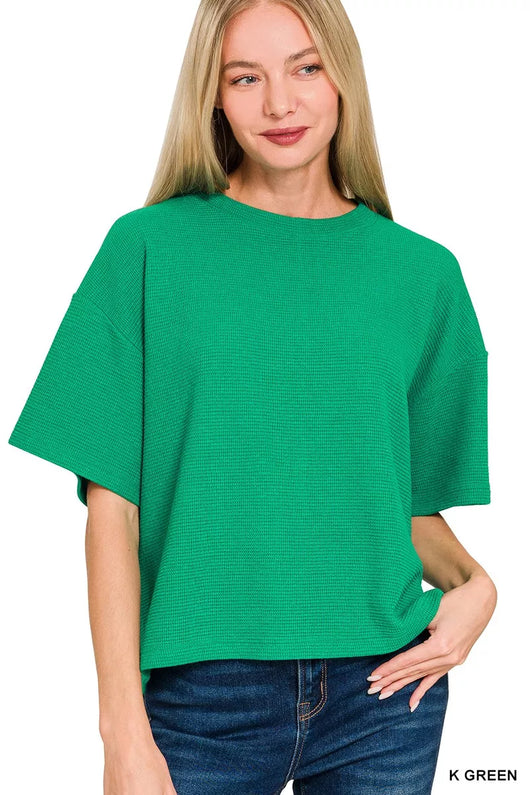 Zenana Full Size Double Knit Side Slits Hi Low Short Sleeve Top Plus Size in vibrant green worn by a model.