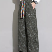 Men's Wide Leg Casual Pants with drawstring and marble pattern, ideal for casual wear and comfort.