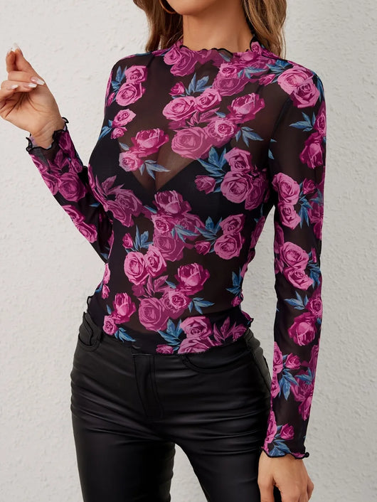 Floral Mock Neck Long Sleeve Top featuring sheer, slightly stretchy fabric with vibrant floral design on a black background.