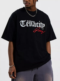 Men's TENACITY Round Neck Short Sleeve T-Shirt in black with 'Brilliance' and 'Glory' graphic design.