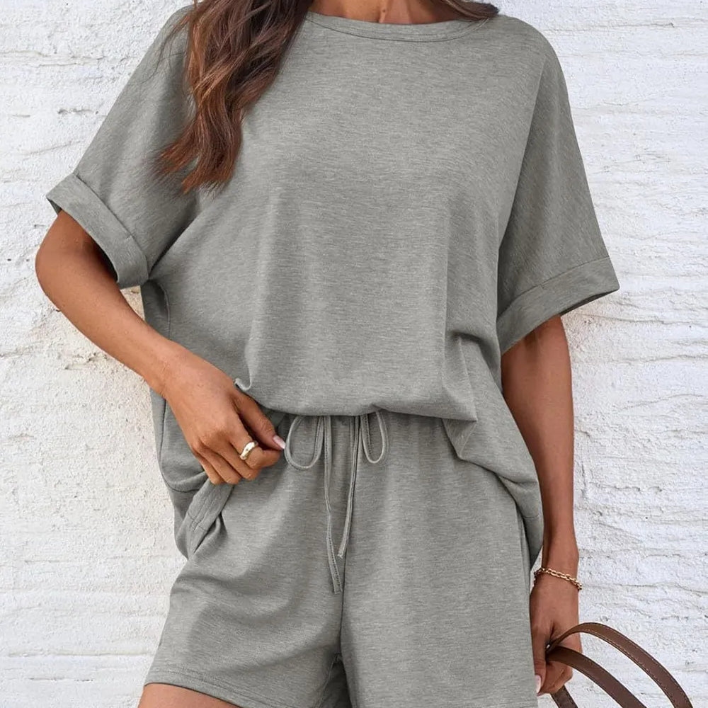 Round Neck T-Shirt and Drawstring Shorts Set in gray, featuring a relaxed fit and drawstring detail.